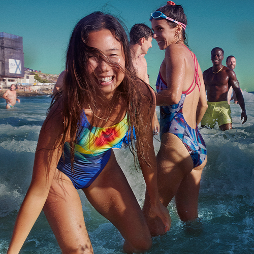 Speedo swimwear. Women swimming in pool in a Speedo swimsuit.